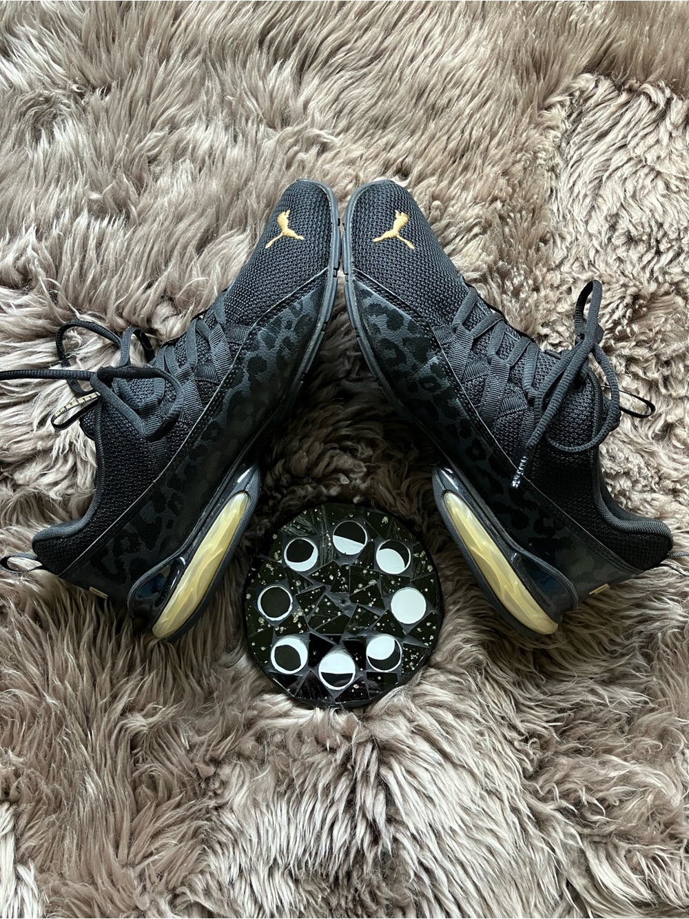 Puma Women's Black Athletic Sneakers with Gold Accents
